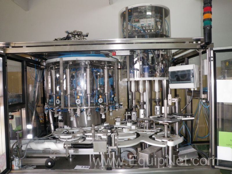 Ronchi Exacta R 12 5 Automated 100 Plastic Bottles per minute Filling and Capping Machine