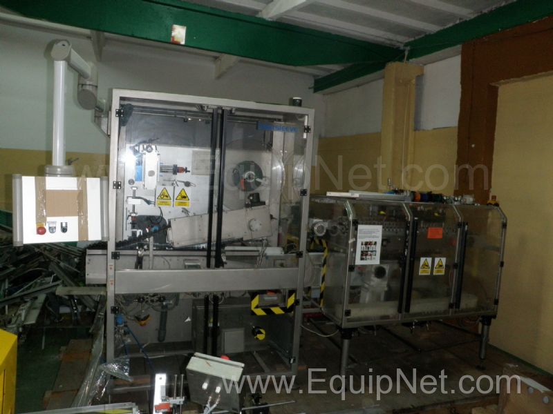 Fuji 4200 H Intersleeve machine for the Automated Sleeving of Mascara tubes