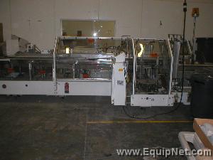 ADCO Vertical Cartoner, Model #12v31-ec, refurbished in 2006, by Ultra Packaging.