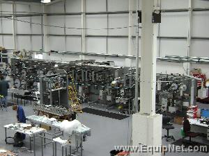 DOYEN FOUR LANE, INTERMITTENT MOTION, MULTILAYER TTS--CONVERTING AND POUCHING MACHINE