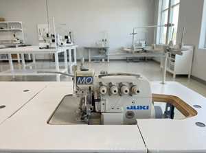 Maquinaria para Fabricación de Telas Juki MO-6814S