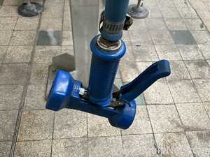 Nederman Hose Reel and Prevost Air Line Reel on Stand