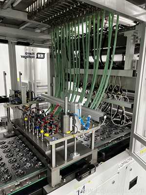Two Harro Hofliger Continuous Pod and Disc Filling and Packaging Lines