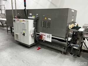 Two Harro Hofliger Continuous Pod and Disc Filling and Packaging Lines