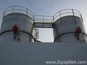 Two Stainless Steel Storage Tanks With Bottom Bin Feeders