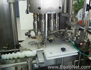 Used Borgo 8 head rotary capper model V8-T with centrifugal bowl and cap elevator