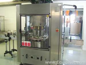 Used Borgo 8 head rotary capper model V8-T with centrifugal bowl and cap elevator