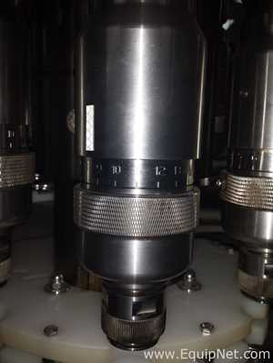 Used Borgo 8 head rotary capper model V8-T with centrifugal bowl and cap elevator