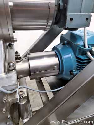 Comminuting hammer mill