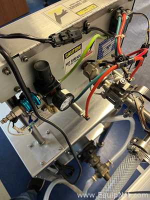Accutek Packaging Equipment Co. Inc. Heated Mini Pinch Bottle Fill Station