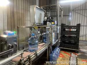 Linha de Envase de Bebidas Cap Snap 300 Metric Adapta.  5 Galão