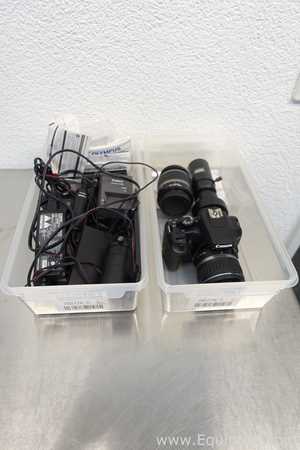 Canon EOS 1000D DS126191 Camera with Charger and Accessories