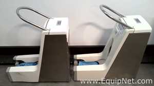 Lot of 2 BootieButler Manual Shoe Cover Dispenser