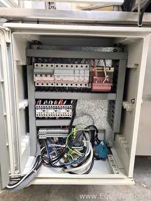 Combinação Envasadora-Tampadora Monobloco  Comas RF1000