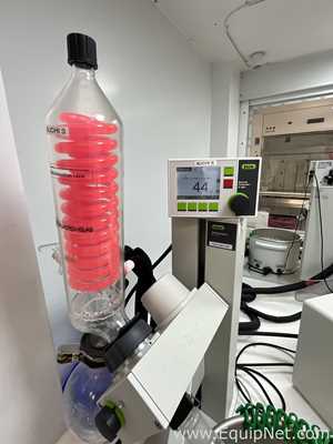 Buchi R-100 Rotary Evaporator with B-100 Heating Bath and V-300 Vacuum Pump