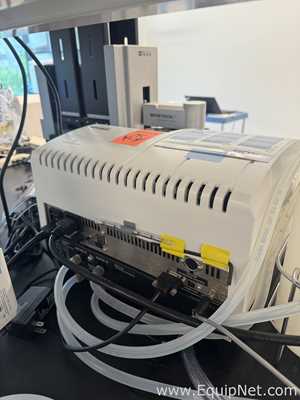 BioTek Instruments 405TSUVS Microplate Washer With Vacuum Pump And BioStack 4 Microplate Stacker