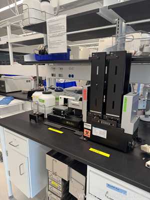 BioTek Instruments 405TSUVS Microplate Washer With Vacuum Pump And BioStack 4 Microplate Stacker