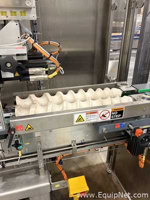 Krones Sleevematic Can Labeler with Checkmat Label Inspection and Shrinkmat Steam Tunnel