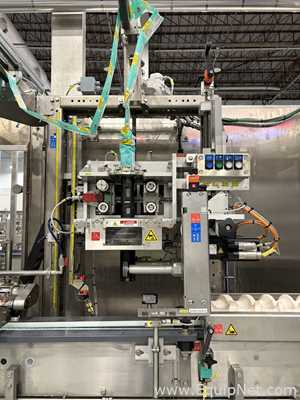 Krones Sleevematic Can Labeler with Checkmat Label Inspection and Shrinkmat Steam Tunnel