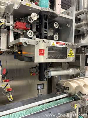 Krones Sleevematic Can Labeler with Checkmat Label Inspection and Shrinkmat Steam Tunnel