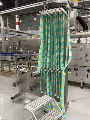 Krones Sleevematic Can Labeler with Checkmat Label Inspection and Shrinkmat Steam Tunnel