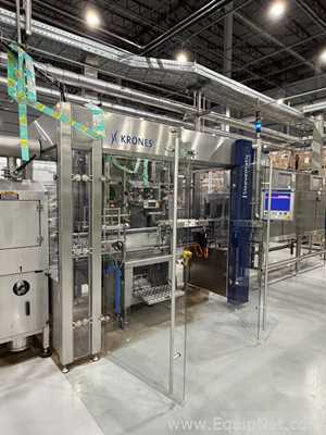 Krones Sleevematic Can Labeler with Checkmat Label Inspection and Shrinkmat Steam Tunnel