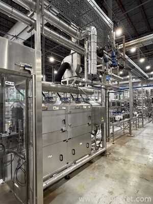 Krones Sleevematic Can Labeler with Checkmat Label Inspection and Shrinkmat Steam Tunnel