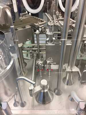 Groninger syringe filling line under RABS, with IPC, tub unwrapping and unpeeling