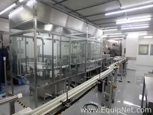 Maquina Monobloque de Llenado-Tapado de Frasco marcaRomacoMacofar modeloLVI4 con Equipos Perifericos