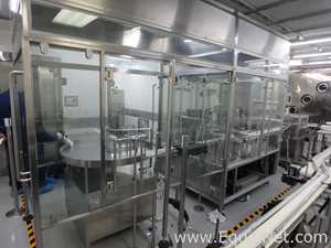 Maquina Monobloque de Llenado-Tapado de Frasco marcaRomacoMacofar modeloLVI4 con Equipos Perifericos