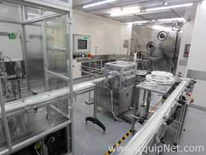 Maquina Monobloque de Llenado-Tapado de Frasco marcaRomacoMacofar modeloLVI4 con Equipos Perifericos