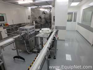 Maquina Monobloque de Llenado-Tapado de Frasco marcaRomacoMacofar modeloLVI4 con Equipos Perifericos