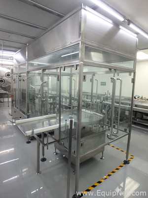 Maquina Monobloque de Llenado-Tapado de Frasco marcaRomacoMacofar modeloLVI4 con Equipos Perifericos