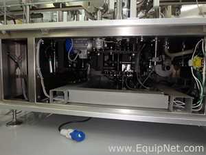 Maquina Monobloque de Llenado-Tapado de Frasco marcaRomacoMacofar modeloLVI4 con Equipos Perifericos