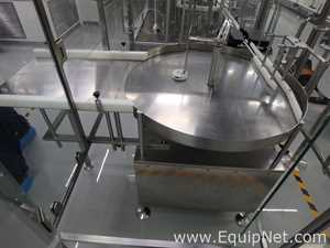 Maquina Monobloque de Llenado-Tapado de Frasco marcaRomacoMacofar modeloLVI4 con Equipos Perifericos