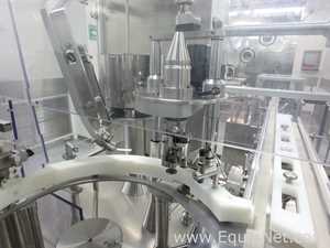 Maquina Monobloque de Llenado-Tapado de Frasco marcaRomacoMacofar modeloLVI4 con Equipos Perifericos