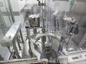 Maquina Monobloque de Llenado-Tapado de Frasco marcaRomacoMacofar modeloLVI4 con Equipos Perifericos