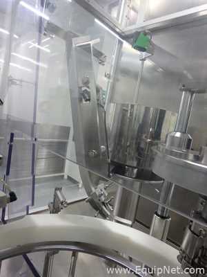 Maquina Monobloque de Llenado-Tapado de Frasco marcaRomacoMacofar modeloLVI4 con Equipos Perifericos