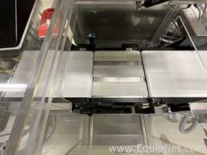 OCS Checkweighers GmbH HC Check Weigher and Reject Station - Syrup Line 4 Packaging