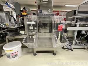 OCS Checkweighers GmbH HC Check Weigher and Reject Station - Syrup Line 4 Packaging