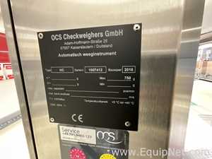 OCS Checkweighers GmbH HC Check Weigher and Reject Station - Syrup Line 4 Packaging