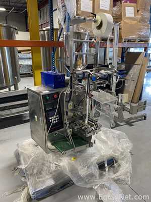 Máquina Vertical Formadora, Llenadora y Selladora  Shanghai Develop Machinery Co. Ltd. DCJ300-3
