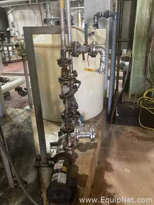 Approximately 6000 gallon Plastic Tank With Stainless Steel Pump  P-4785