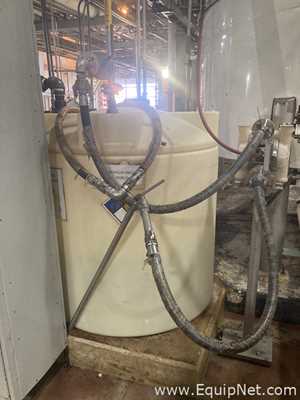 Approximately 6000 gallon Plastic Tank With Stainless Steel Pump  P-4785