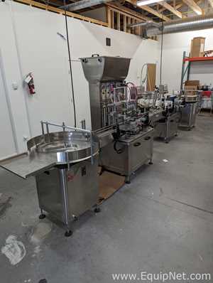 Filling Line for Viscous Products with Piston Filler and Labeler