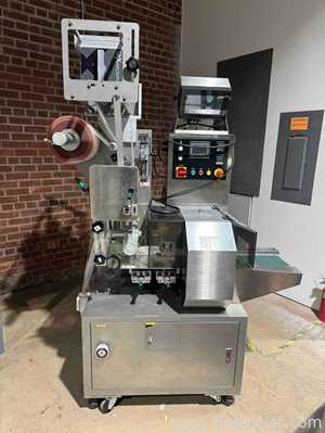 Embaladora de Fluxo PAC Machinery Group FW400HMI