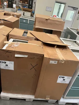 Lot of Lab Storage Counters and Cabinets, Agave and Light Neutral Colors and one pump