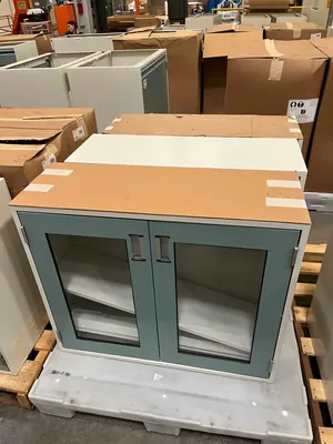 Lot of Lab Storage Counters and Cabinets, Agave and Light Neutral Colors and one pump