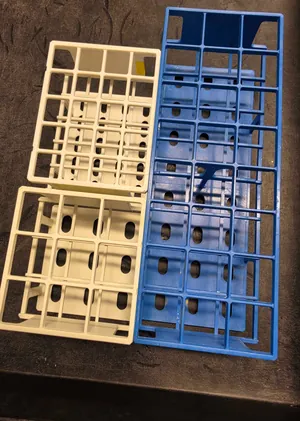 Lot of Assorted Laboratory Tube Racks and Plastic Beakers