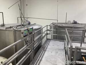 Approximately 3200 Gallon Stainless Steel Mixing Tank